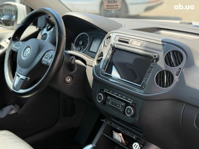 Білий Фольксваген Тігуан, об'ємом двигуна 2 л та пробігом 250 тис. км за 16490 $, фото 18 на Automoto.ua