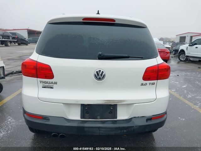 Белый Фольксваген Тигуан, объемом двигателя 2 л и пробегом 115 тыс. км за 9500 $, фото 4 на Automoto.ua