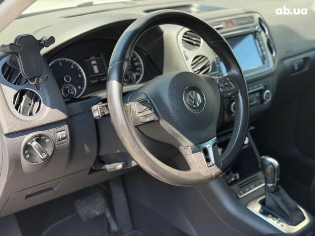 Білий Фольксваген Тігуан, об'ємом двигуна 2 л та пробігом 250 тис. км за 16490 $, фото 19 на Automoto.ua