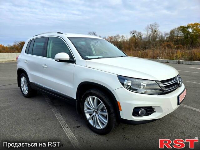Білий Фольксваген Тігуан, об'ємом двигуна 2 л та пробігом 263 тис. км за 12300 $, фото 2 на Automoto.ua