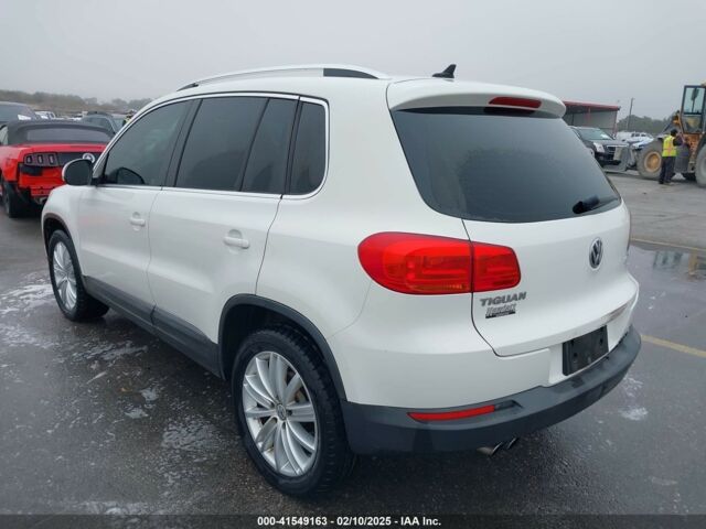 Белый Фольксваген Тигуан, объемом двигателя 2 л и пробегом 115 тыс. км за 9500 $, фото 3 на Automoto.ua