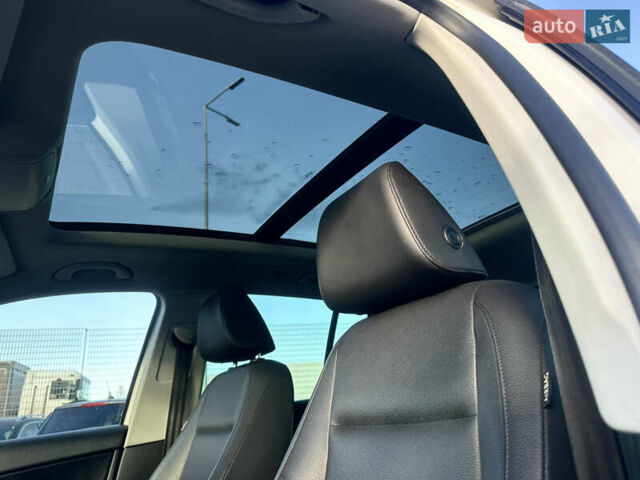 Белый Фольксваген Тигуан, объемом двигателя 2 л и пробегом 248 тыс. км за 9999 $, фото 11 на Automoto.ua