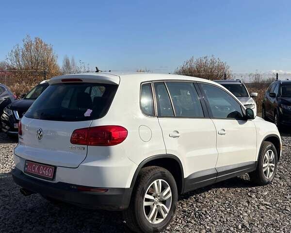 Білий Фольксваген Тігуан, об'ємом двигуна 2 л та пробігом 209 тис. км за 9499 $, фото 3 на Automoto.ua