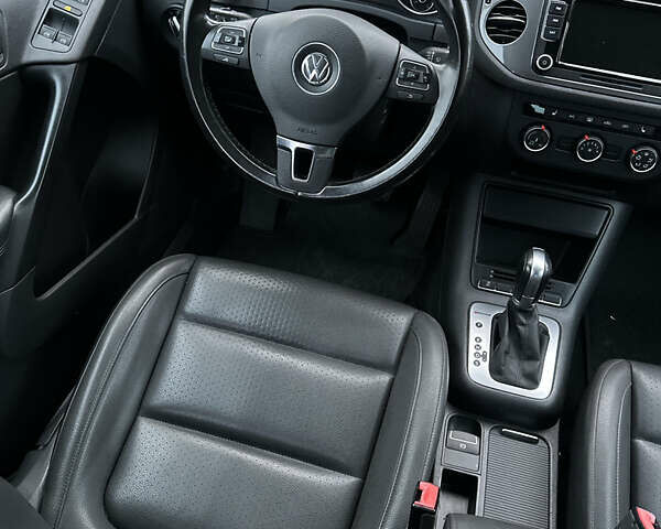 Білий Фольксваген Тігуан, об'ємом двигуна 2 л та пробігом 205 тис. км за 10250 $, фото 20 на Automoto.ua