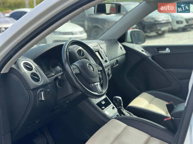 Білий Фольксваген Тігуан, об'ємом двигуна 2 л та пробігом 152 тис. км за 12300 $, фото 14 на Automoto.ua