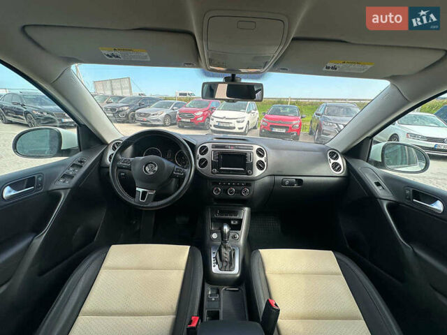 Білий Фольксваген Тігуан, об'ємом двигуна 2 л та пробігом 152 тис. км за 12300 $, фото 26 на Automoto.ua