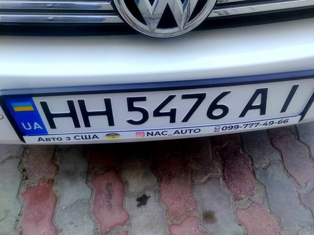 Белый Фольксваген Тигуан, объемом двигателя 2 л и пробегом 150 тыс. км за 12500 $, фото 1 на Automoto.ua