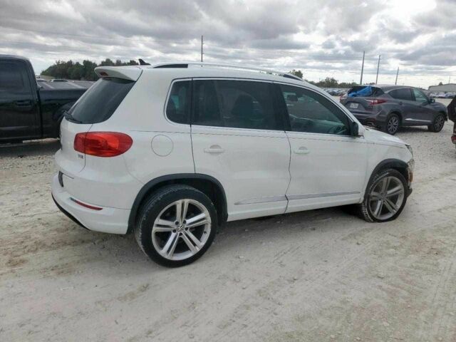 Білий Фольксваген Тігуан, об'ємом двигуна 0 л та пробігом 61 тис. км за 2000 $, фото 2 на Automoto.ua