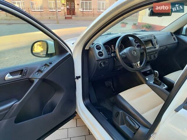 Белый Фольксваген Тигуан, объемом двигателя 2 л и пробегом 216 тыс. км за 11700 $, фото 16 на Automoto.ua