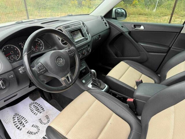 Белый Фольксваген Тигуан, объемом двигателя 2 л и пробегом 210 тыс. км за 9000 $, фото 4 на Automoto.ua