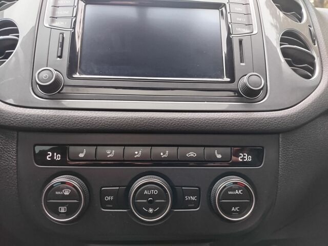 Білий Фольксваген Тігуан, об'ємом двигуна 2 л та пробігом 140 тис. км за 12200 $, фото 2 на Automoto.ua