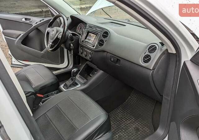 Білий Фольксваген Тігуан, об'ємом двигуна 1.98 л та пробігом 157 тис. км за 14300 $, фото 1 на Automoto.ua