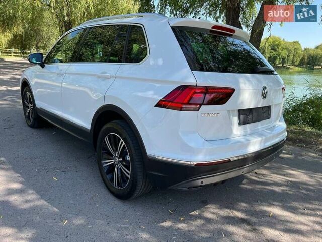 Білий Фольксваген Тігуан, об'ємом двигуна 2 л та пробігом 270 тис. км за 23000 $, фото 3 на Automoto.ua