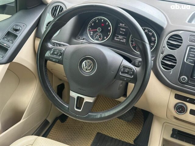 Білий Фольксваген Тігуан, об'ємом двигуна 2 л та пробігом 156 тис. км за 14990 $, фото 20 на Automoto.ua