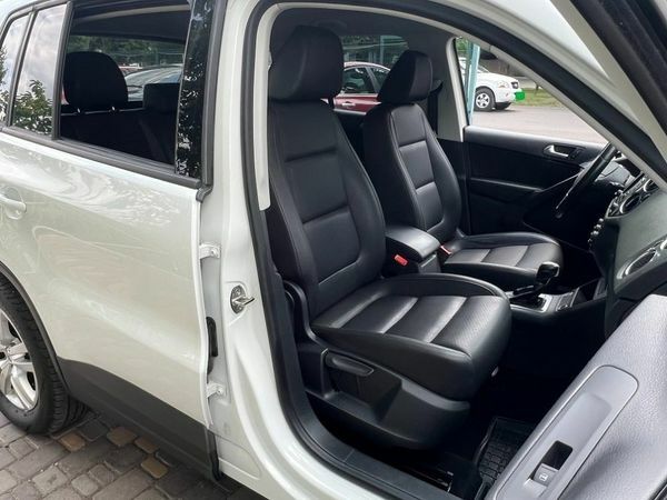 Белый Фольксваген Тигуан, объемом двигателя 2 л и пробегом 200 тыс. км за 14000 $, фото 6 на Automoto.ua