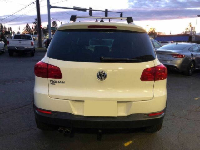 Белый Фольксваген Тигуан, объемом двигателя 2 л и пробегом 70 тыс. км за 7000 $, фото 5 на Automoto.ua