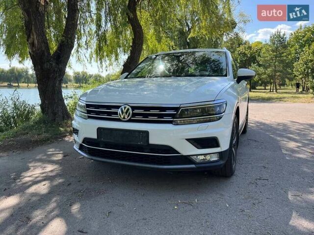 Білий Фольксваген Тігуан, об'ємом двигуна 2 л та пробігом 270 тис. км за 23000 $, фото 2 на Automoto.ua