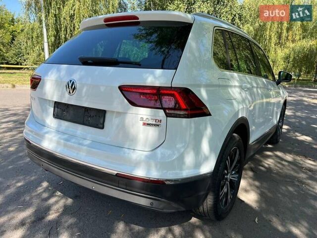 Білий Фольксваген Тігуан, об'ємом двигуна 2 л та пробігом 270 тис. км за 23000 $, фото 21 на Automoto.ua
