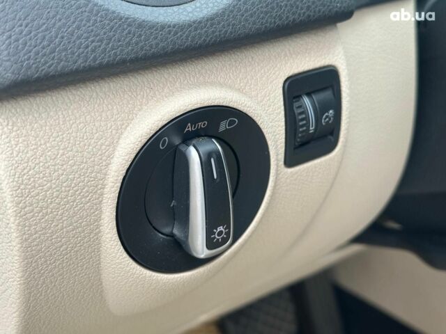 Білий Фольксваген Тігуан, об'ємом двигуна 2 л та пробігом 156 тис. км за 14990 $, фото 12 на Automoto.ua