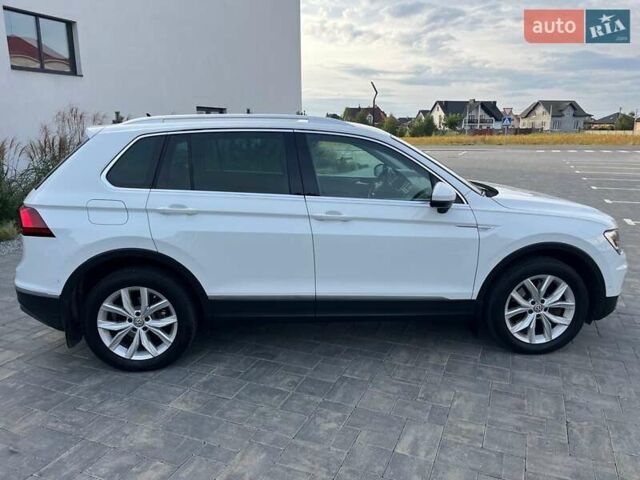 Білий Фольксваген Тігуан, об'ємом двигуна 2 л та пробігом 248 тис. км за 21500 $, фото 12 на Automoto.ua