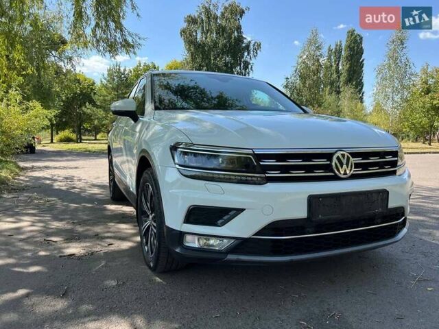 Білий Фольксваген Тігуан, об'ємом двигуна 2 л та пробігом 270 тис. км за 23000 $, фото 1 на Automoto.ua