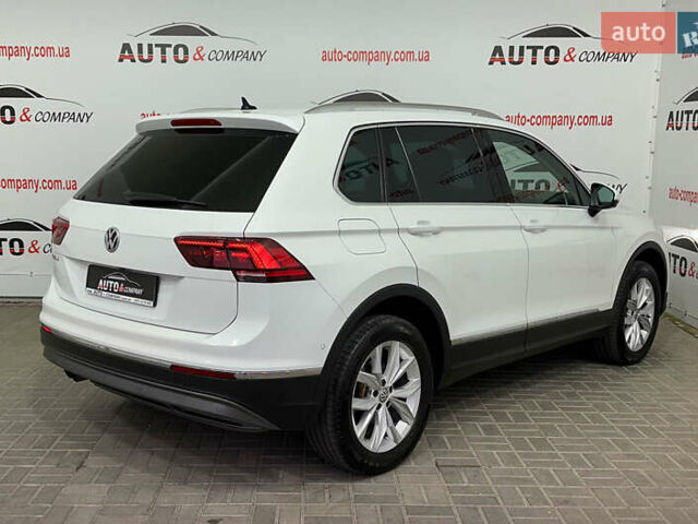 Білий Фольксваген Тігуан, об'ємом двигуна 1.98 л та пробігом 178 тис. км за 24950 $, фото 2 на Automoto.ua