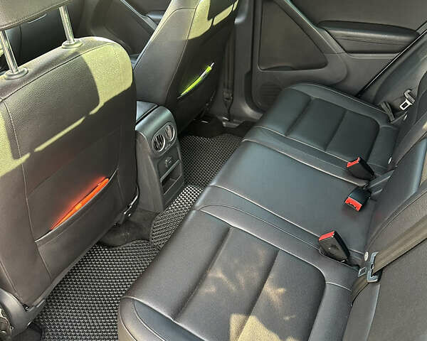 Білий Фольксваген Тігуан, об'ємом двигуна 1.98 л та пробігом 140 тис. км за 14000 $, фото 13 на Automoto.ua