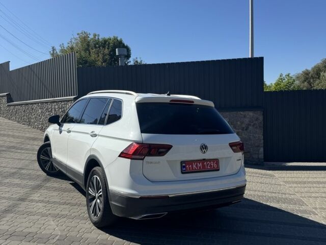 Білий Фольксваген Тігуан, об'ємом двигуна 2 л та пробігом 151 тис. км за 23000 $, фото 2 на Automoto.ua