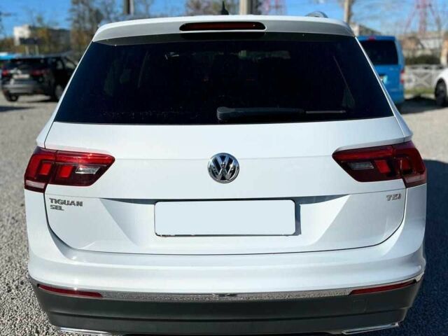 Білий Фольксваген Тігуан, об'ємом двигуна 2 л та пробігом 201 тис. км за 18600 $, фото 2 на Automoto.ua