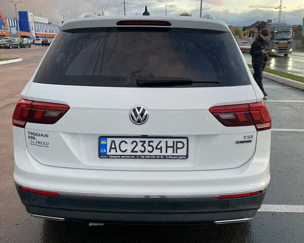 Білий Фольксваген Тігуан, об'ємом двигуна 1.98 л та пробігом 128 тис. км за 24000 $, фото 4 на Automoto.ua
