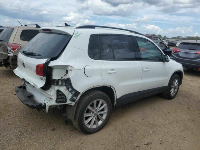 Білий Фольксваген Тігуан, об'ємом двигуна 2 л та пробігом 56 тис. км за 1200 $, фото 2 на Automoto.ua