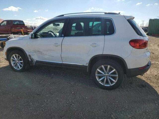 Білий Фольксваген Тігуан, об'ємом двигуна 2 л та пробігом 130 тис. км за 2900 $, фото 2 на Automoto.ua