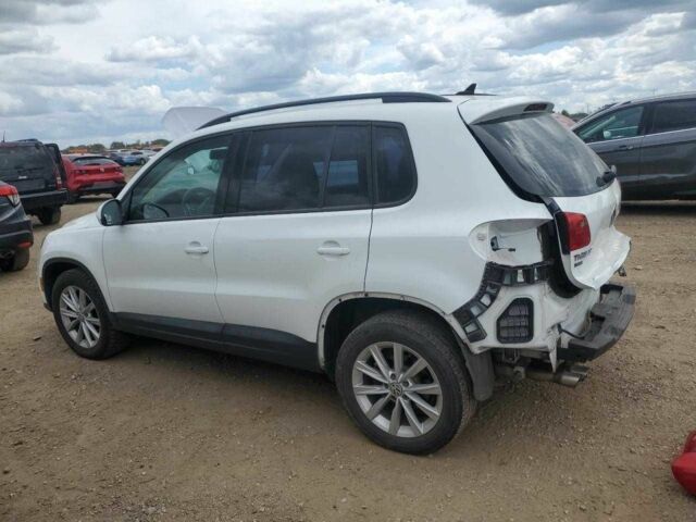 Білий Фольксваген Тігуан, об'ємом двигуна 2 л та пробігом 56 тис. км за 1200 $, фото 1 на Automoto.ua