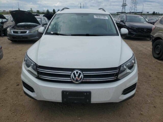 Білий Фольксваген Тігуан, об'ємом двигуна 2 л та пробігом 56 тис. км за 1200 $, фото 4 на Automoto.ua