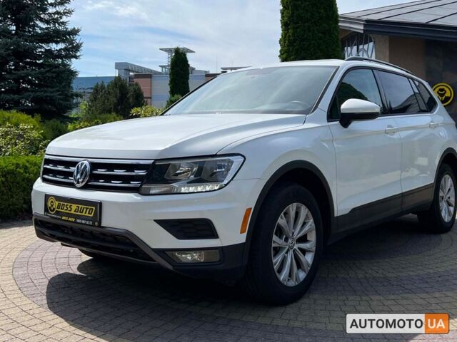 Білий Фольксваген Тігуан, об'ємом двигуна 2 л та пробігом 115 тис. км за 16999 $, фото 2 на Automoto.ua
