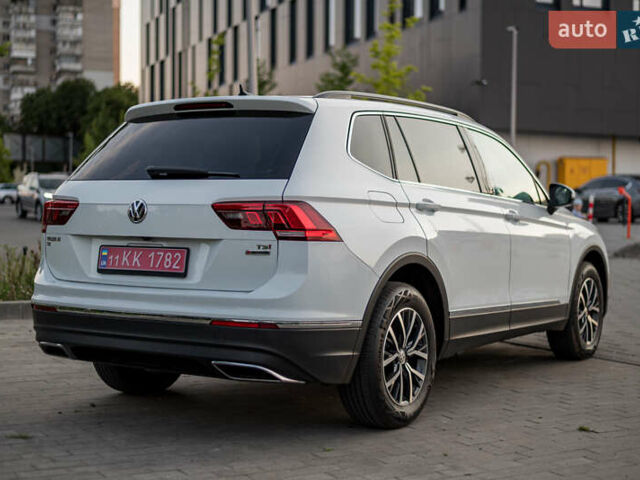 Білий Фольксваген Тігуан, об'ємом двигуна 2 л та пробігом 169 тис. км за 20900 $, фото 1 на Automoto.ua