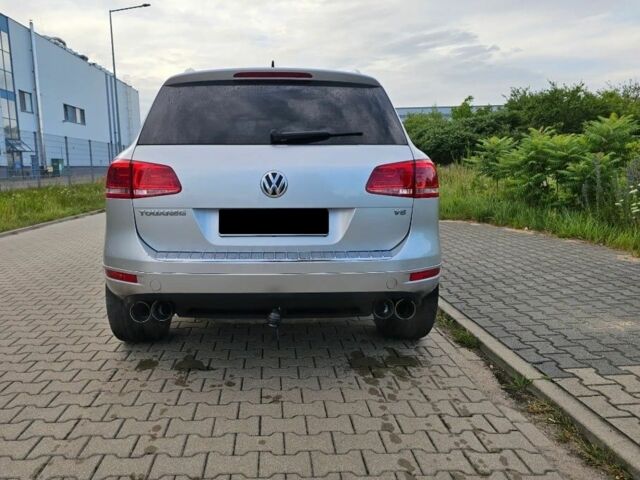 Білий Фольксваген Тігуан, об'ємом двигуна 2 л та пробігом 146 тис. км за 10200 $, фото 2 на Automoto.ua