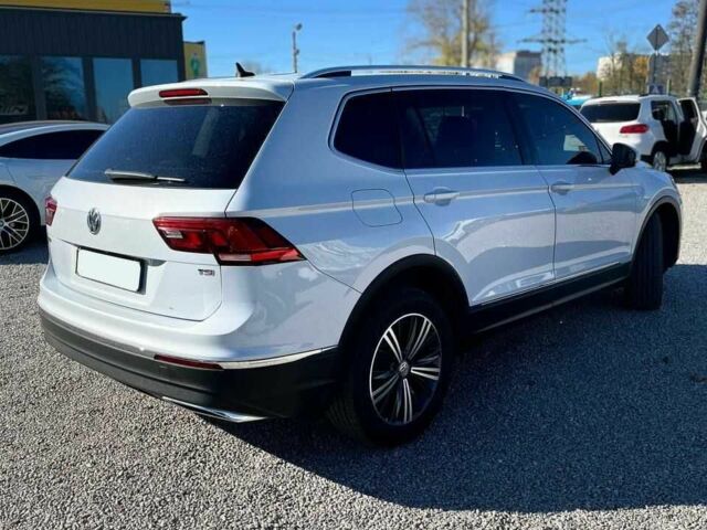 Білий Фольксваген Тігуан, об'ємом двигуна 2 л та пробігом 201 тис. км за 18600 $, фото 1 на Automoto.ua