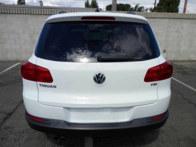 Белый Фольксваген Тигуан, объемом двигателя 2 л и пробегом 61 тыс. км за 8000 $, фото 4 на Automoto.ua