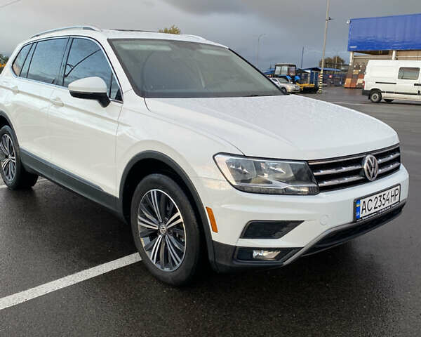 Білий Фольксваген Тігуан, об'ємом двигуна 1.98 л та пробігом 128 тис. км за 24000 $, фото 2 на Automoto.ua