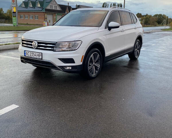Білий Фольксваген Тігуан, об'ємом двигуна 1.98 л та пробігом 128 тис. км за 24000 $, фото 1 на Automoto.ua