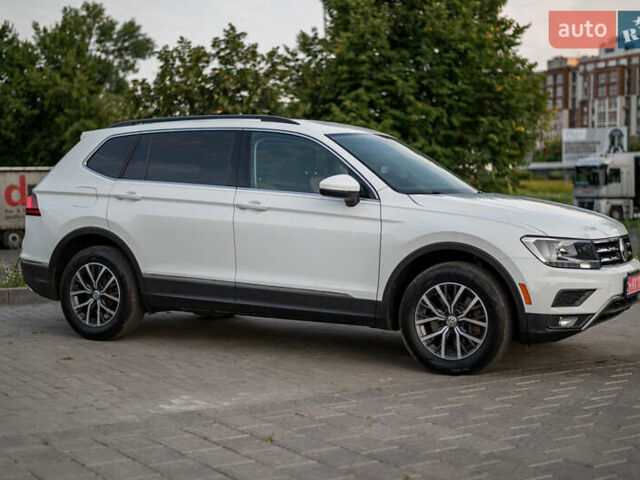 Білий Фольксваген Тігуан, об'ємом двигуна 2 л та пробігом 169 тис. км за 20900 $, фото 6 на Automoto.ua