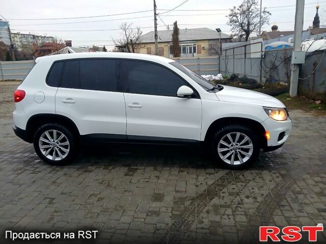 Белый Фольксваген Тигуан, объемом двигателя 2 л и пробегом 174 тыс. км за 15000 $, фото 1 на Automoto.ua