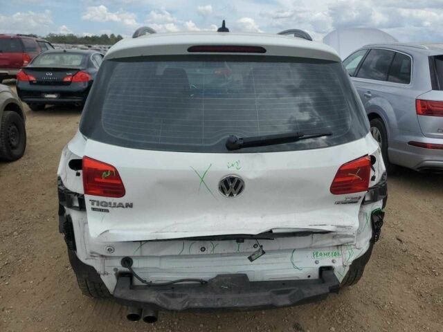 Білий Фольксваген Тігуан, об'ємом двигуна 2 л та пробігом 56 тис. км за 1200 $, фото 5 на Automoto.ua