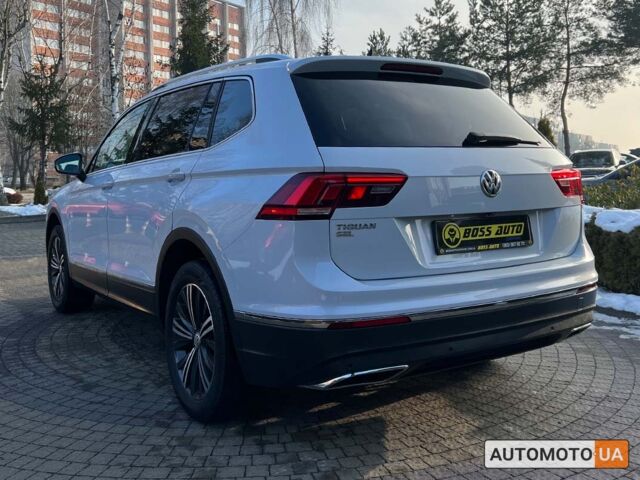 Білий Фольксваген Тігуан, об'ємом двигуна 2 л та пробігом 113 тис. км за 22800 $, фото 4 на Automoto.ua
