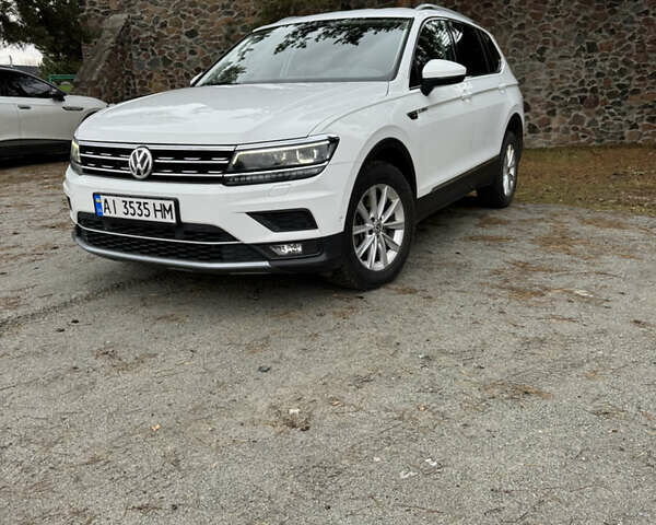 Білий Фольксваген Тігуан, об'ємом двигуна 1.98 л та пробігом 180 тис. км за 28700 $, фото 1 на Automoto.ua