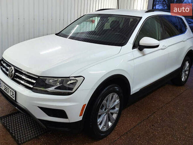 Білий Фольксваген Тігуан, об'ємом двигуна 2 л та пробігом 145 тис. км за 23600 $, фото 63 на Automoto.ua