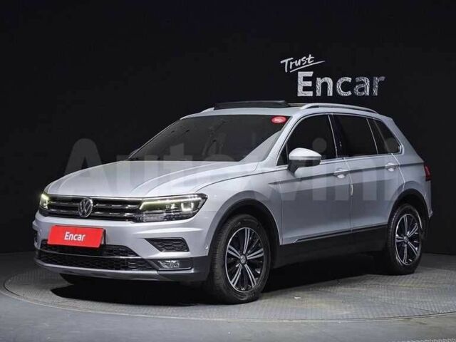 Белый Фольксваген Тигуан, объемом двигателя 2 л и пробегом 57 тыс. км за 16200 $, фото 1 на Automoto.ua