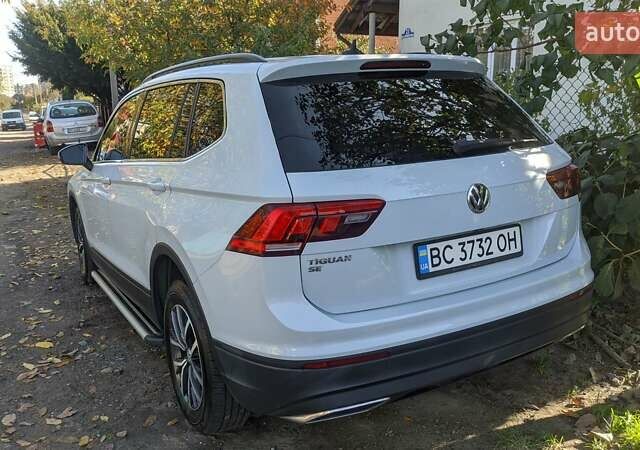 Белый Фольксваген Тигуан, объемом двигателя 2 л и пробегом 106 тыс. км за 22700 $, фото 1 на Automoto.ua