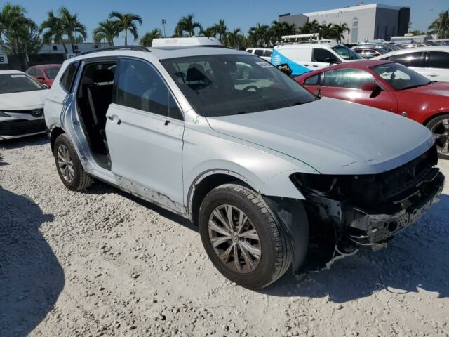 Білий Фольксваген Тігуан, об'ємом двигуна 2 л та пробігом 160 тис. км за 12999 $, фото 2 на Automoto.ua